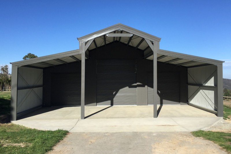 Barn shed with open portal section at front