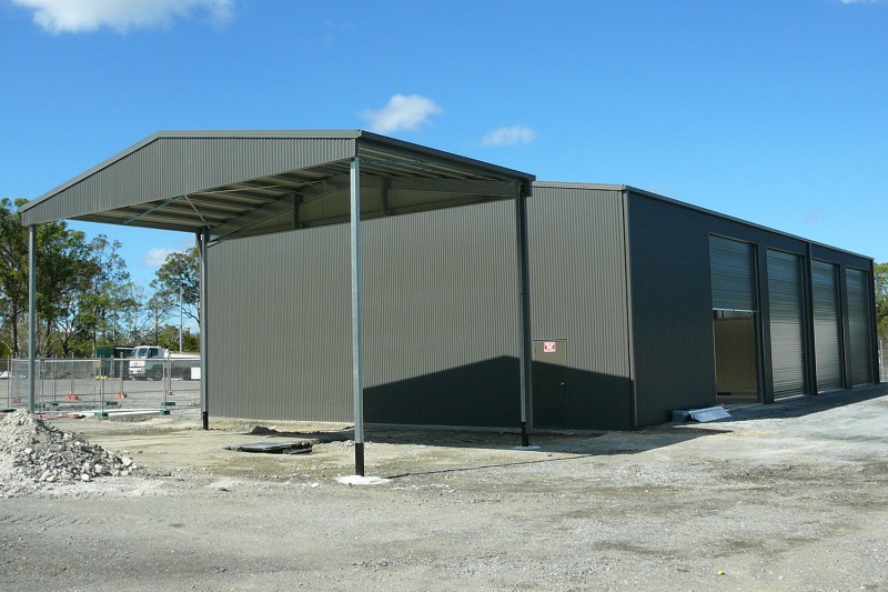 Commercial Cover next to large workshop shed