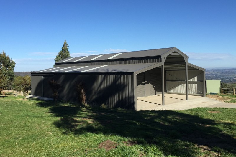 Custom barn with portal frame extension