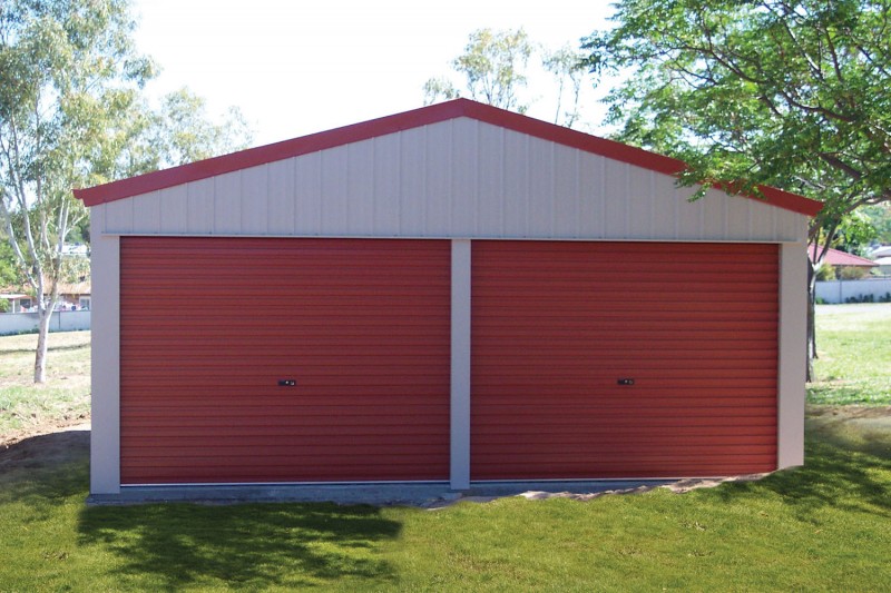 Double garage with red roller doors