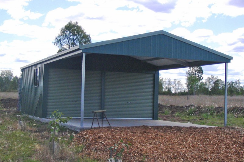 Double garaport with gable infill