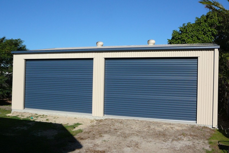 Large double garage with twin doors on length