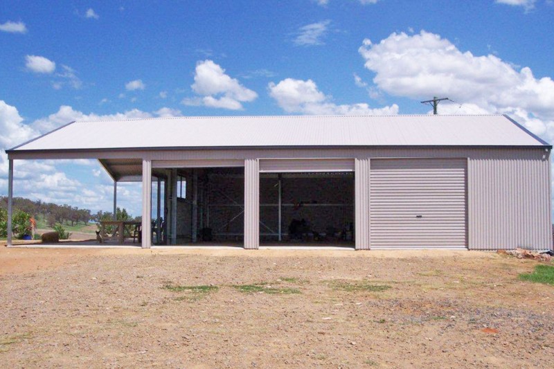 Large workshop shed with garaport extension