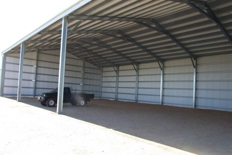 Open front farm shed with beamover