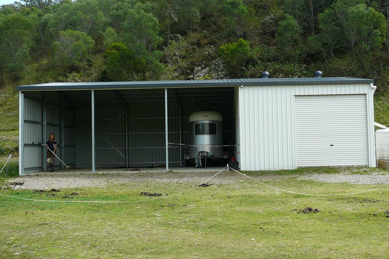 Open front farm shed with lock up bay