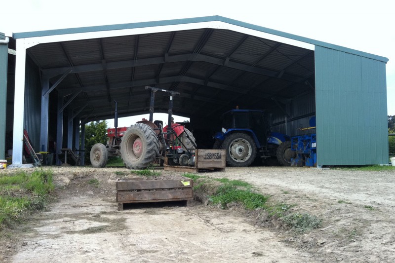 Open gable end farm shed with extra wall sheeting