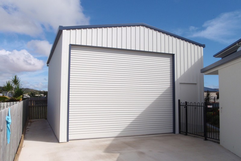 Single garage with offset roller door with pa door