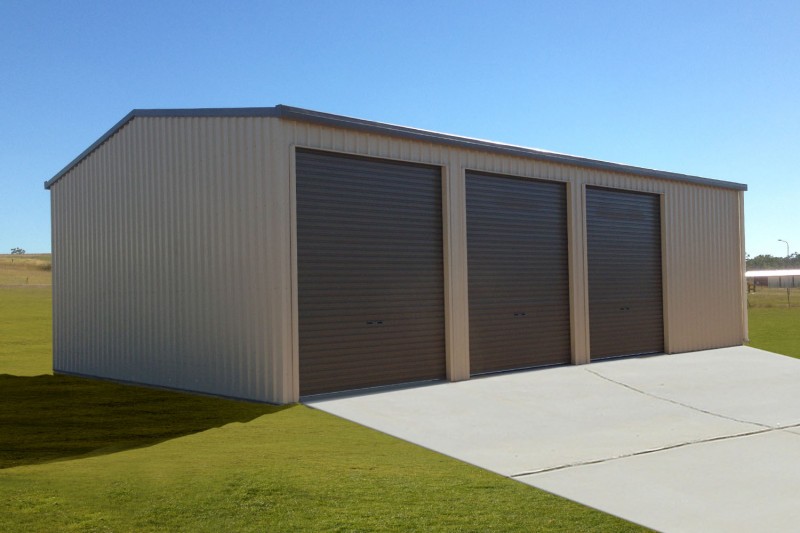 Triple garage with doors on length plus extra storage